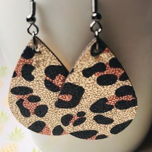 Faux and real leather earrings Teardrop style.